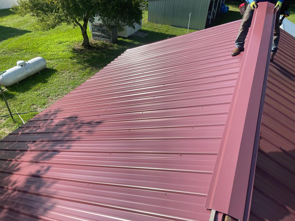 Red metal roof of a residential property